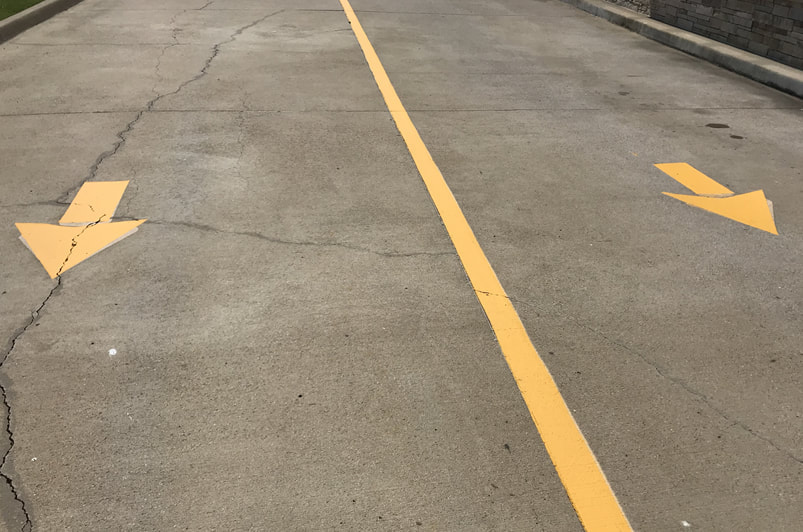 Directional arrows painted in your parking lot in Athens, Georgia