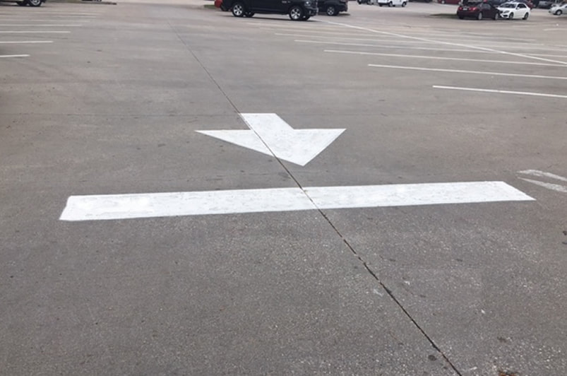 Directional arrows in your parking lot in Athens, GA